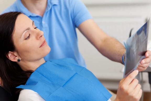 A dental consultation with an X-ray