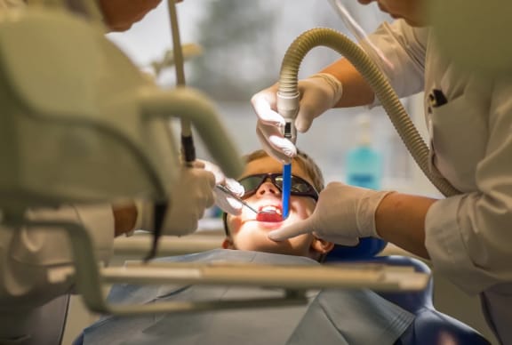 A patient receiving dental treatment